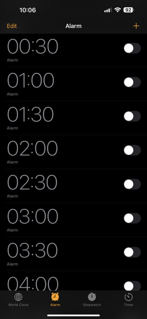 List of alarms on an iOS device, starting at 00.30 and going to 04.00 in half hour increments.