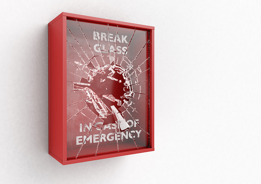 An empty red emergency box with a shattering in case of emergency breakable glass on the front on an isolated background - 3D render