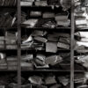Ancient archive of dusted papers in a forgotten storage place.